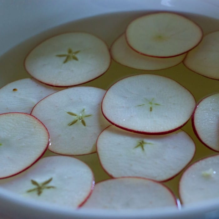 apple slices in honey water