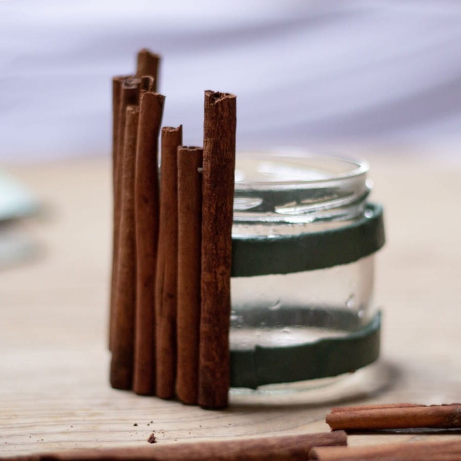 put cinnamon sticks onto jar